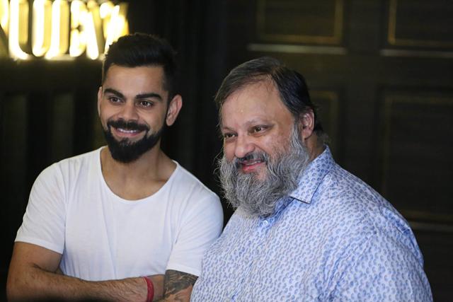 (LtoR) Virat Kohli with Sourish Bhattacharyya. (LtoR) Virat Kohli with Sourish Bhattacharyya.