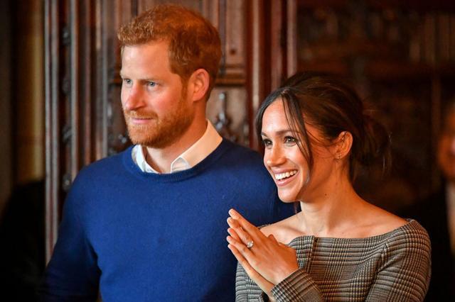 Britain's Prince Harry and his fiancee Meghan Markle watch a performance by a Welsh choir in the banqueting hall during a visit to Cardiff Castle in Cardiff, Britain, January 18, 2018. (Reuters File Photo) Britain's Prince Harry and his fiancee Meghan Markle watch a performance by a Welsh choir in the banqueting hall during a visit to Cardiff Castle in Cardiff, Britain, January 18, 2018. (Reuters File Photo)