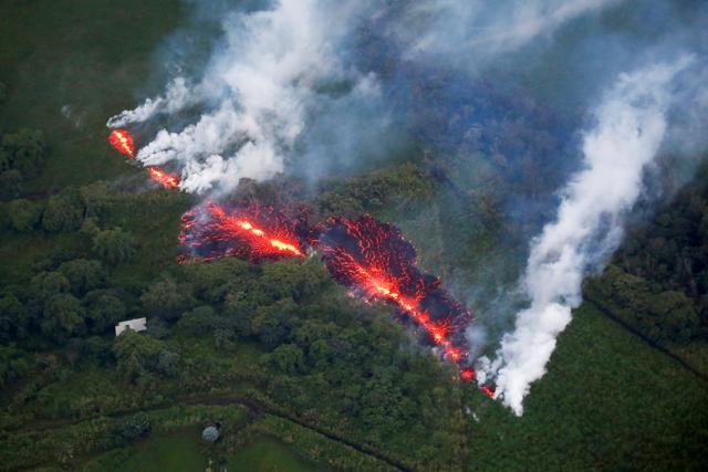 Lava erupts from a fissure east of the Leilani Estates subdivision during ongoing eruptions of the Kilauea Volcano in Hawaii, U.S., May 13, 2018. (REUTERS) Lava erupts from a fissure east of the Leilani Estates subdivision during ongoing eruptions of the Kilauea Volcano in Hawaii, U.S., May 13, 2018. (REUTERS)