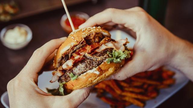 Putting on weight in adulthood (after the age of 18) with those extra munchies and burgers can also lead to breast cancer. (Shutterstock)