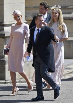 James Corden and his wife Julia Carey arrive for the wedding ceremony of Prince Harry and Meghan Markle at St. Georges Chapel in Windsor Castle in Windsor, near London. (AP) James Corden and his wife Julia Carey arrive for the wedding ceremony of Prince Harry and Meghan Markle at St. Georges Chapel in Windsor Castle in Windsor, near London. (AP)