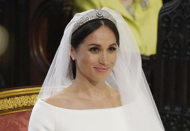 Meghan Markle smiles during her wedding ceremony to Britain's Prince Harry at St. George's Chapel in Windsor Castle in Windsor, near London, England, Saturday. (AP) Meghan Markle smiles during her wedding ceremony to Britain's Prince Harry at St. George's Chapel in Windsor Castle in Windsor, near London, England, Saturday. (AP)