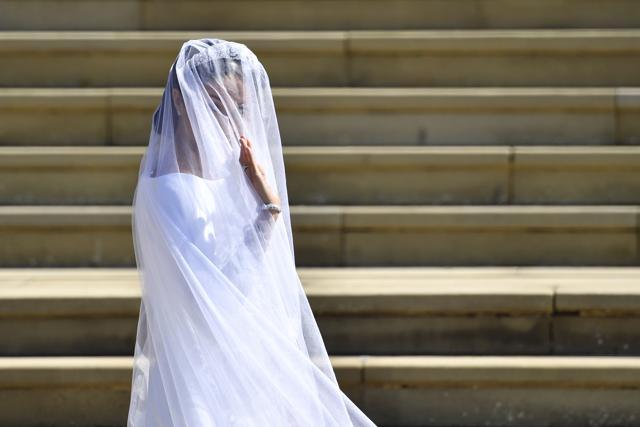 Meghan Markle arrives for her wedding at St. George's Chapel in Windsor Castle in Windsor. (AP) Meghan Markle arrives for her wedding at St. George's Chapel in Windsor Castle in Windsor. (AP)