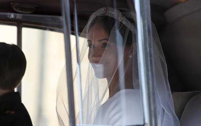 Meghan Markle arrives for the wedding ceremony to Prince Harry at St. George's Chapel in Windsor Castle in Windsor. (REUTERS) Meghan Markle arrives for the wedding ceremony to Prince Harry at St. George's Chapel in Windsor Castle in Windsor. (REUTERS)