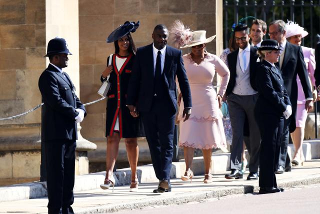 Idris Elba and Sabrina Dhowre arrive at the wedding of Prince Harry to Meghan Markle at St Georges Chapel. (REUTERS) Idris Elba and Sabrina Dhowre arrive at the wedding of Prince Harry to Meghan Markle at St Georges Chapel. (REUTERS)