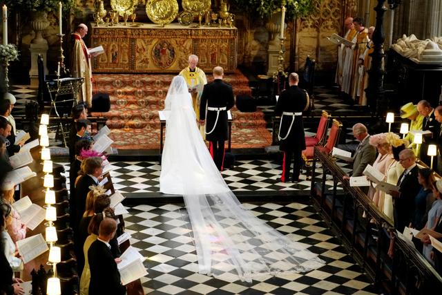 Prince Harry and Meghan Markle in St George's Chapel at Windsor Castle during their wedding service, conducted by the Archbishop of Canterbury Justin Welby in Windsor. (REUTERS) Prince Harry and Meghan Markle in St George's Chapel at Windsor Castle during their wedding service, conducted by the Archbishop of Canterbury Justin Welby in Windsor. (REUTERS)