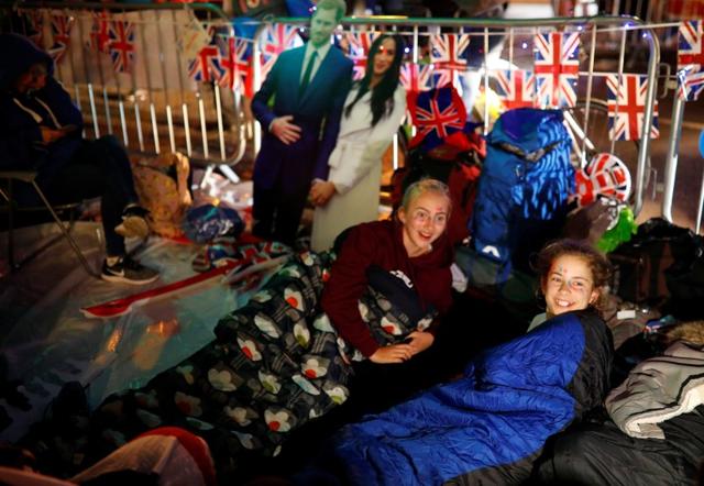 Fans of the royal family camp outside Windsor Castle prior to the wedding of Prince Harry and Meghan Markle in Windsor, Britain, on May 18, 2018. (Reuters)