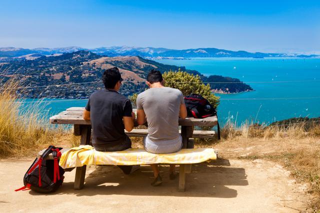 People enjoying the beautiful views from the summit of Angel Island in the San Francisco Bay on a sunny day. (Shutterstock)