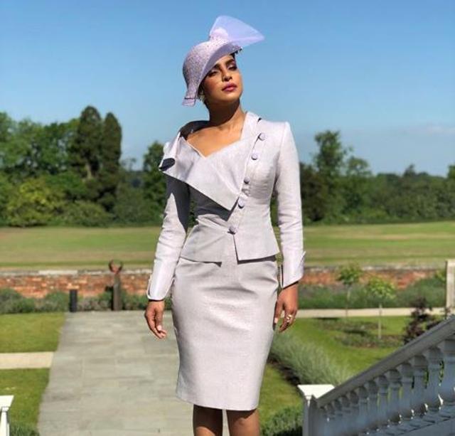 Priyanka Chopra poses in her look for the royal wedding.