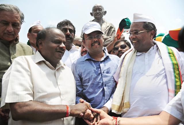 Former Karnataka chief minister Siddaramaiah and his son Yathindra in Bengaluru. (PTI Photo) Former Karnataka chief minister Siddaramaiah and his son Yathindra in Bengaluru. (PTI Photo)
