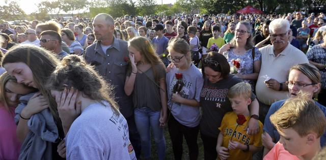 Mourners gather during a prayer vigil following a shooting at Santa Fe High School in Santa Fe, Texas, on Friday, May 18, 2018. (AP)