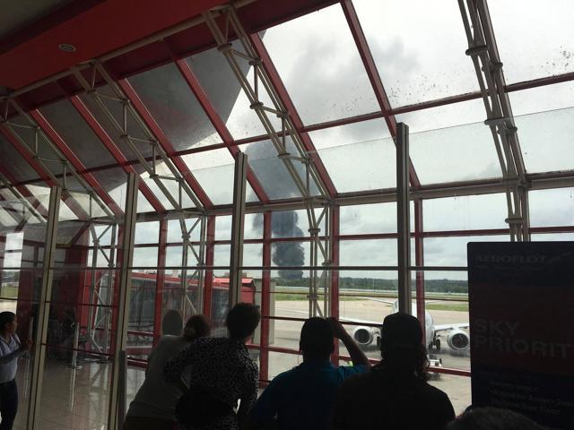 People watch as smoke rises from the site where a plane crashed shortly after taking off from Havana, Cuba. (Reuters Photo) People watch as smoke rises from the site where a plane crashed shortly after taking off from Havana, Cuba. (Reuters Photo)