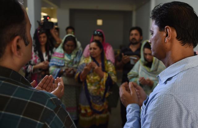 Abdul Aziz (C), father of Sabika, a student who was killed in mass shooting at a US school in the Texas town of Santa Fe, and mourners pray for her in Karachi on May 19, 2018. (AFP) Abdul Aziz (C), father of Sabika, a student who was killed in mass shooting at a US school in the Texas town of Santa Fe, and mourners pray for her in Karachi on May 19, 2018. (AFP)