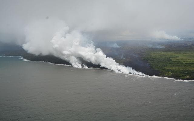 The USGS said the plume of white smoke is a disturbing mixture of hydrochloric acid gas (HCl), steam and tiny volcanic glass particles. (AFP) The USGS said the plume of white smoke is a disturbing mixture of hydrochloric acid gas (HCl), steam and tiny volcanic glass particles. (AFP)