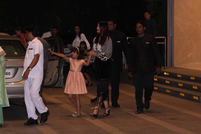 Aaradhya points to her grandmother Vrinda Rai as they leave for home. (Viral Bhayani)