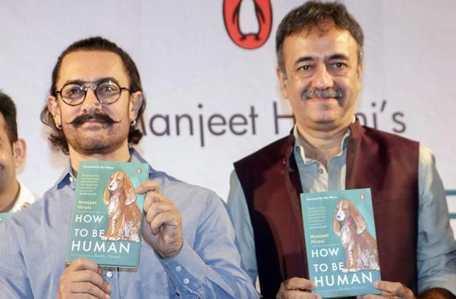 Aamir Khan with Rajkumar Hirani at a book launch titled How to be Human: Life lessons from Buddy Hirani written by Manjeet Hirani in Mumbai on Monday. (PTI)