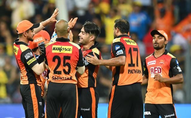 Sunrisers Hyderabad’s Rashid Khan (C) celebrates with teammates after taking the wicket of Chennai Super Kings batsman MS Dhoni during the IPL 2018 first qualifier in Mumbai on May 22, 2018. (AFP) Sunrisers Hyderabad’s Rashid Khan (C) celebrates with teammates after taking the wicket of Chennai Super Kings batsman MS Dhoni during the IPL 2018 first qualifier in Mumbai on May 22, 2018. (AFP)