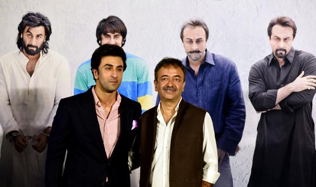 Indian Bollywood actor Ranbir Kapoor (L) poses for a picture with film Director Rajkumar Hirani during the teaser launch of his upcoming Indian biographical drama Hindi film Sanju, based on the life of Bollywood actor Sanjay Dutt. (AFP)