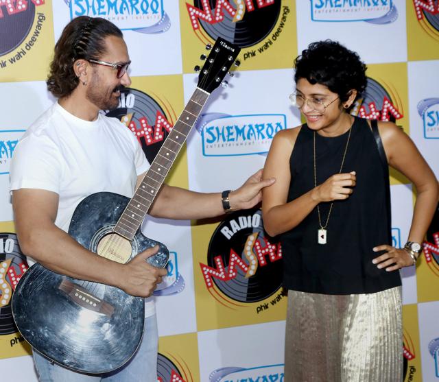 Aamir Khan gets playful with wife Kiran Rao. (PTI) Aamir Khan gets playful with wife Kiran Rao. (PTI)