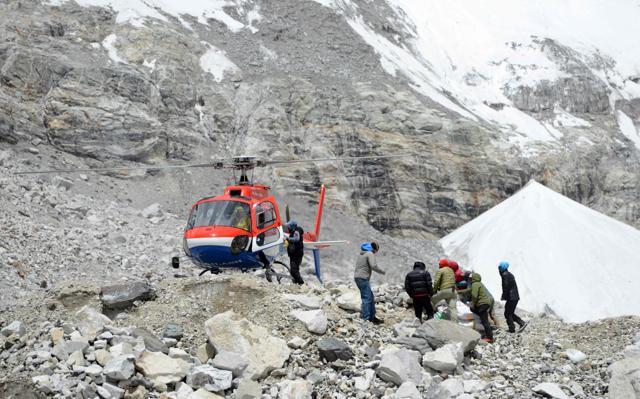 A helicopter delivers supplies to Everest base camp, some 140 kilometres northeast of Kathmandu. Climbers who want a break from high altitude life can even hitch a heli ride back to Kathmandu for some R and R before returning to attempt the summit. (AFP) A helicopter delivers supplies to Everest base camp, some 140 kilometres northeast of Kathmandu. Climbers who want a break from high altitude life can even hitch a heli ride back to Kathmandu for some R and R before returning to attempt the summit. (AFP)