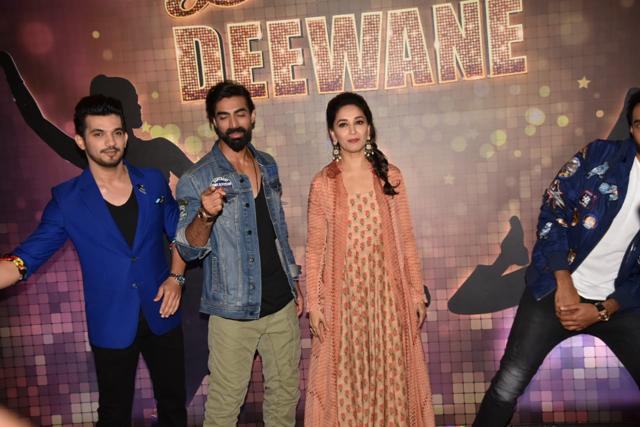 Choreographer Tushar and Arjun Bijlani pose with Madhuri while Shashank Khaitan escapes the frame. (Viral Bhayani) Choreographer Tushar and Arjun Bijlani pose with Madhuri while Shashank Khaitan escapes the frame. (Viral Bhayani)