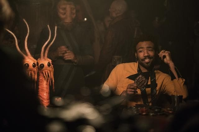 This image released by Lucasfilm shows Donald Glover as Lando Calrissian in a scene from Solo: A Star Wars Story. (AP) This image released by Lucasfilm shows Donald Glover as Lando Calrissian in a scene from Solo: A Star Wars Story. (AP)