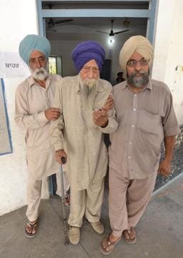 90-year-old Gurjant Singh at the polling booth after casting his vote in Talwandi Madho village near Malsian in Shahkot on Monday. (Pardeep Pandit/HT ) 90-year-old Gurjant Singh at the polling booth after casting his vote in Talwandi Madho village near Malsian in Shahkot on Monday. (Pardeep Pandit/HT )