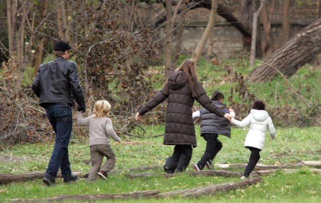 Brad Pitt and Angelina Jolie take their children Pax, Zahara and Shiloh to a park in Budapest, Hungary in 2010. (Shutterstock)