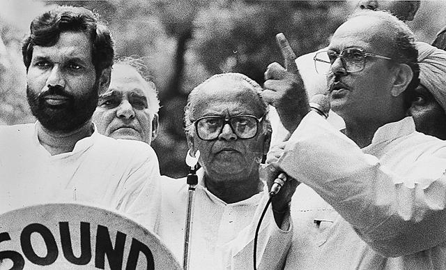 VP Singh addressing a Pro-Mandal Rally in New Delhi on 07 August 1991. Also in the picture are Janata Dal President SR Bommai, Chandrajit Yadav and Ram Vilas Paswan. (HT Photo) VP Singh addressing a Pro-Mandal Rally in New Delhi on 07 August 1991. Also in the picture are Janata Dal President SR Bommai, Chandrajit Yadav and Ram Vilas Paswan. (HT Photo)