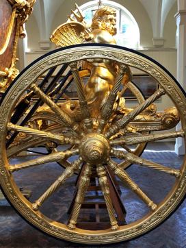 This photo shows a detail from the gold state coach in the Royal Mews in London. The site houses stables, a carriage house and a garage for the royal family at Buckingham Palace. (AP) This photo shows a detail from the gold state coach in the Royal Mews in London. The site houses stables, a carriage house and a garage for the royal family at Buckingham Palace. (AP)