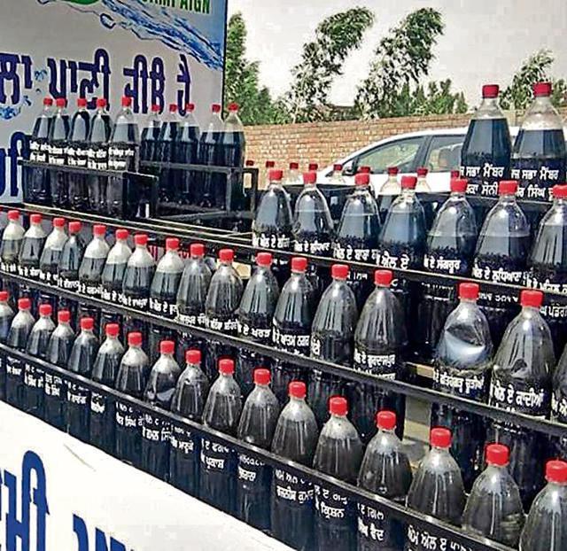The bottles were carried in a special vehicle from the nullah. (HT Photo) The bottles were carried in a special vehicle from the nullah. (HT Photo)