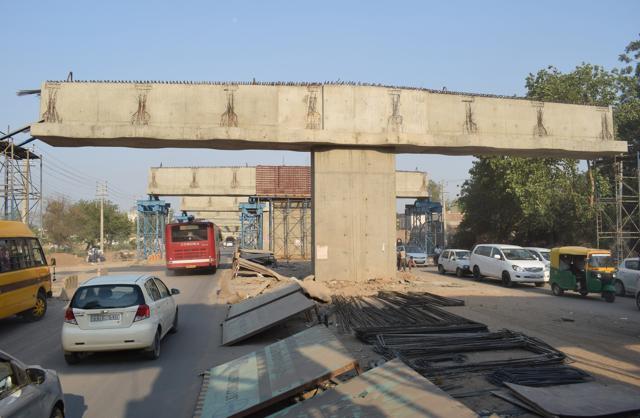 Commuters have to contend with heavy construction material strewn at various places on this road. (Sikander Singh Chopra/HT) Commuters have to contend with heavy construction material strewn at various places on this road. (Sikander Singh Chopra/HT)