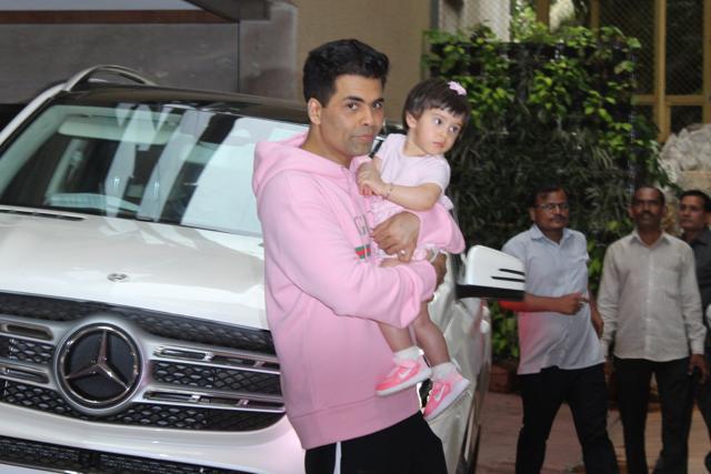 Pretty girl, Roohi, with daddy Karan Johar. (Viral Bhayani)