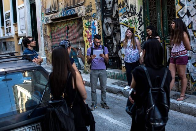 Historian Nicolas Nicolaides gives a walking tour of landmarks of same-sex love in Athens on June 1, 2018, as part of a week-long roster of events for the annual Athens Pride event. (AFP) Historian Nicolas Nicolaides gives a walking tour of landmarks of same-sex love in Athens on June 1, 2018, as part of a week-long roster of events for the annual Athens Pride event. (AFP)