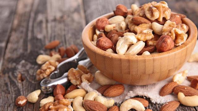 Walnuts and almonds they aid in reducing free testosterone levels and help balance hormones. (Shutterstock) Walnuts and almonds they aid in reducing free testosterone levels and help balance hormones. (Shutterstock)