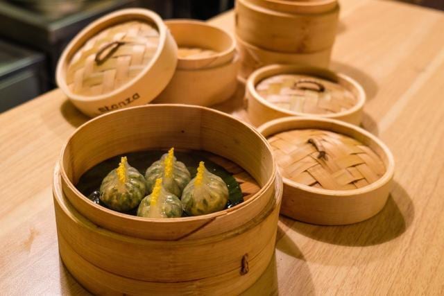 The taste of the truffle oil is missing in the smoked edamame and truffle dim sum; the edamame has a chalky, mashed pea-like texture and tastes overpoweringly of garlic.