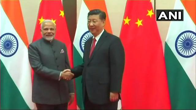 Prime Minister Narendra Modi with Chinese President Xi Jinping in Qingdao. Prime Minister Narendra Modi with Chinese President Xi Jinping in Qingdao.