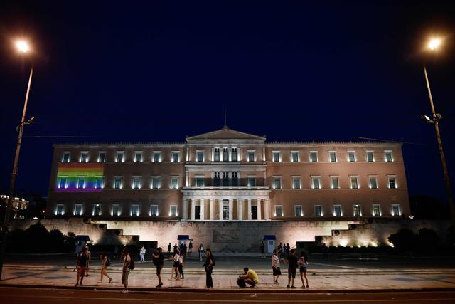 A rainbow flag is projected on the facade of the Greek parliament building in Athens during the annual Gay Pride Parade on June 9. (AFP Photo) A rainbow flag is projected on the facade of the Greek parliament building in Athens during the annual Gay Pride Parade on June 9. (AFP Photo)