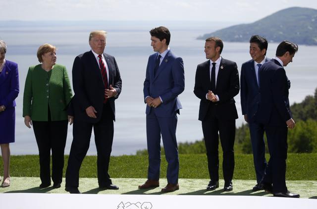 Britain's Prime Minister Theresa May, Germany's Chancellor Angela Merkel, U.S. President Donald Trump, Italy's Prime Minister Giuseppe Conte, Canada's Prime Minister Justin Trudeau, France's President Emmanuel Macron, Japan's Prime Minister Shinzo Abe and Italy's Prime Minister Giuseppe Conte gather for a family photo at the G7 Summit in the Charlevoix city of La Malbaie, Quebec. (REUTERS) Britain's Prime Minister Theresa May, Germany's Chancellor Angela Merkel, U.S. President Donald Trump, Italy's Prime Minister Giuseppe Conte, Canada's Prime Minister Justin Trudeau, France's President Emmanuel Macron, Japan's Prime Minister Shinzo Abe and Italy's Prime Minister Giuseppe Conte gather for a family photo at the G7 Summit in the Charlevoix city of La Malbaie, Quebec. (REUTERS)