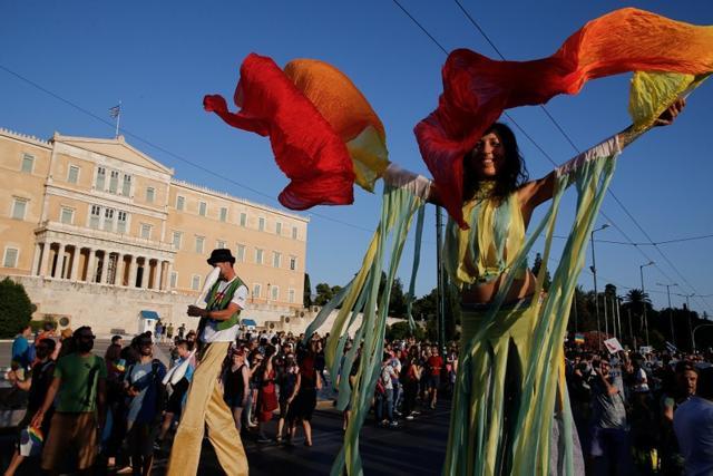 Participants are pictured at a Gay Pride parade in Athens, Greece . (REUTERS) Participants are pictured at a Gay Pride parade in Athens, Greece . (REUTERS)