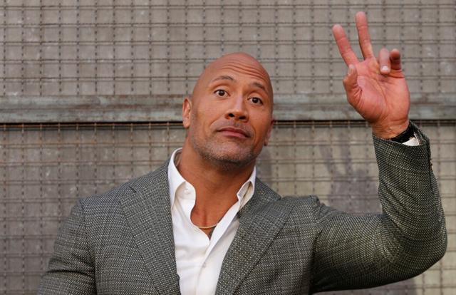 Dwayne Johnson arrives for the premiere of Rampage. (REUTERS)