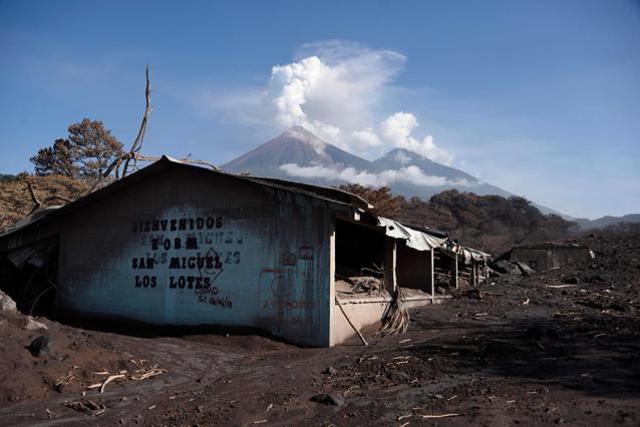 The Fuego Volcano continues to release ash and smoke more than a week after a violent eruption, as seen from the village of San Miguel Los Lotes, in Escuintla Department, about 35 km southwest of Guatemala City. (AFP) The Fuego Volcano continues to release ash and smoke more than a week after a violent eruption, as seen from the village of San Miguel Los Lotes, in Escuintla Department, about 35 km southwest of Guatemala City. (AFP)