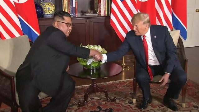US President Donald Trump and North Korean leader Kim Jong Un shake hands ahead of their meeting at Capella Hotel in Singapore on June 12. (AP Photo) US President Donald Trump and North Korean leader Kim Jong Un shake hands ahead of their meeting at Capella Hotel in Singapore on June 12. (AP Photo)