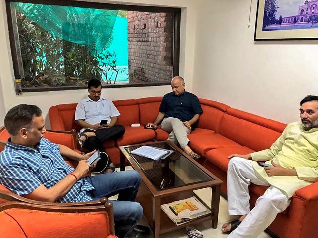 Delhi Chief Minister Arvind Kejriwal, Deputy CM Manish Sisodia, Aam Aadmi Party (AAP) leaders Satyendra Kumar Jain and Gopal Rai during a sit-in protest at Lieutenant Governor Anil Baijal’s residence. (PTI) Delhi Chief Minister Arvind Kejriwal, Deputy CM Manish Sisodia, Aam Aadmi Party (AAP) leaders Satyendra Kumar Jain and Gopal Rai during a sit-in protest at Lieutenant Governor Anil Baijal’s residence. (PTI)