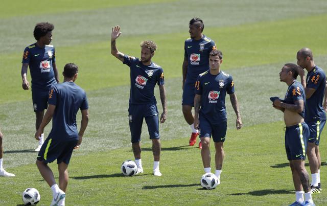 Brazil's Neymar waves to fans during a training session in Sochi, Russia. (AP) Brazil's Neymar waves to fans during a training session in Sochi, Russia. (AP)