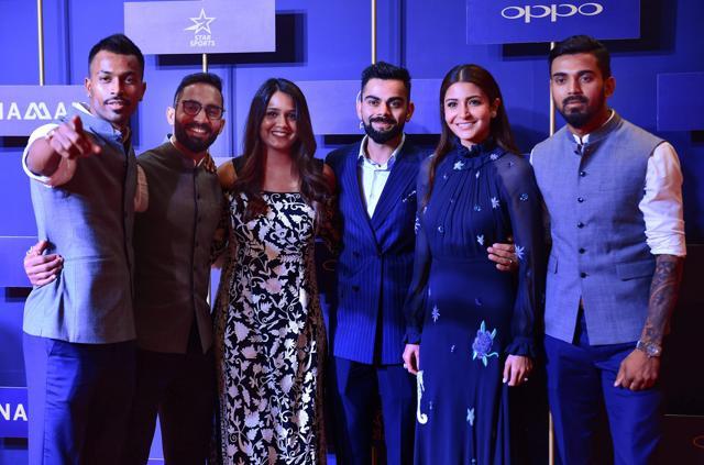 Indian cricketer Hardik Pandya, wicketkeeper Dinesh Karthik with his wife Dipika Pallikal, Indian cricket captain Virat Kohli with his wife Anushka Sharma and cricketer K. L. Rahul pose for a group photograph during the BCCI annual awards, in Bengaluru. (PTI)