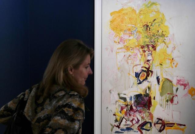 A woman looks at an artwork by Joan Mitchell titled "Composition" on June 12, 2018 during the preview day of Art Basel. (AFP) A woman looks at an artwork by Joan Mitchell titled "Composition" on June 12, 2018 during the preview day of Art Basel. (AFP)