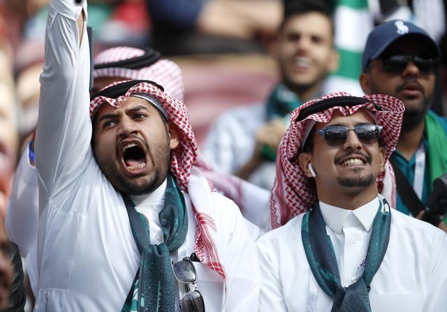 Saudi supporters react ahead of the group A match between Russia and Saudi Arabia which opens the 2018 soccer World Cup at the Luzhniki stadium. (AP)