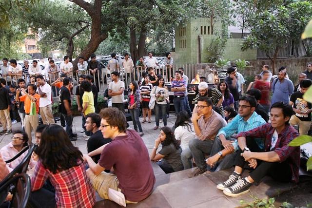 Attendees sit enrapt enjoying the performances at the fest.