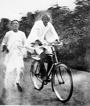 Gandhi cycling back to the Ashram from Gujarat Vidyapith in 1928. (Photo Courtesy: Sabarmati Ashram Preservation and Memorial Trust) Gandhi cycling back to the Ashram from Gujarat Vidyapith in 1928. (Photo Courtesy: Sabarmati Ashram Preservation and Memorial Trust)